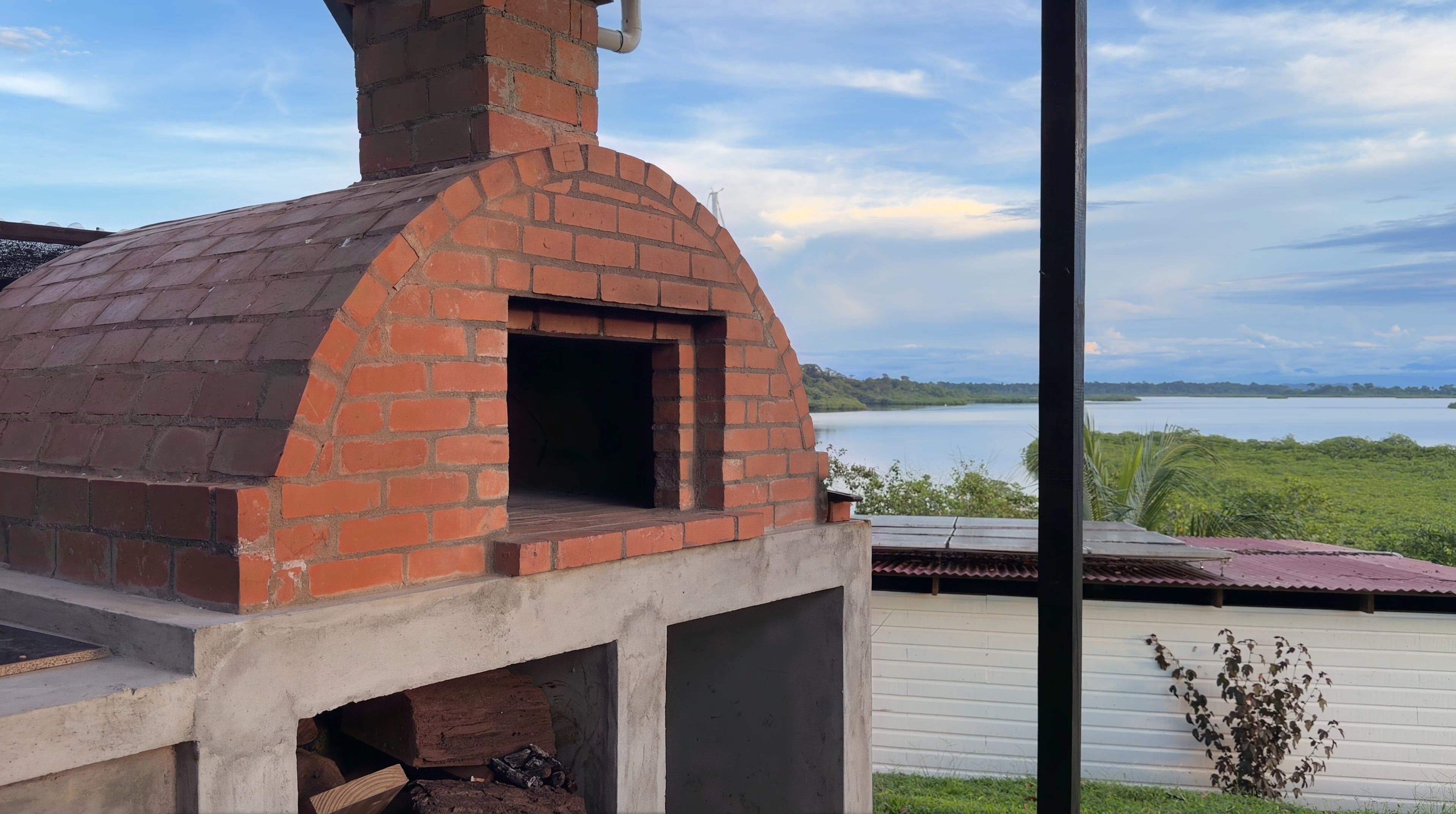 The clay oven, with the lagoon behind it