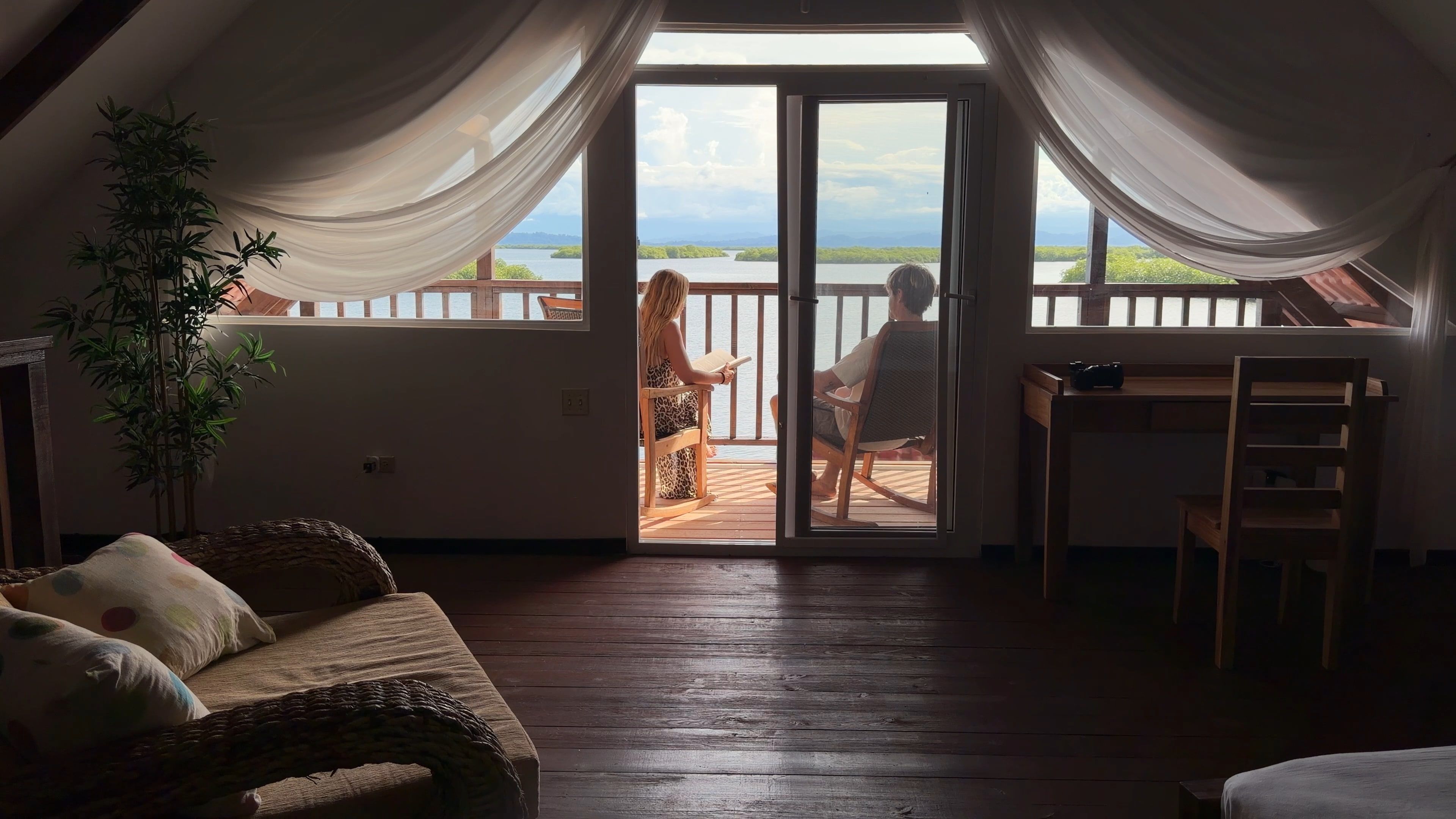 The lagoon seen from the bedroom, through the curtains