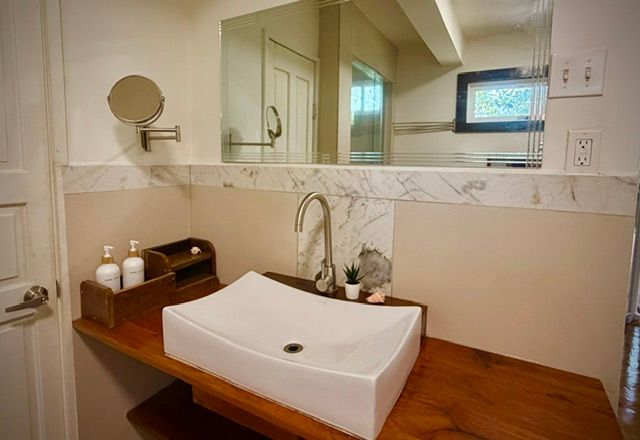 The sink, with the bath amenities