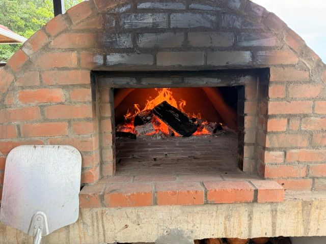 The clay oven, lit